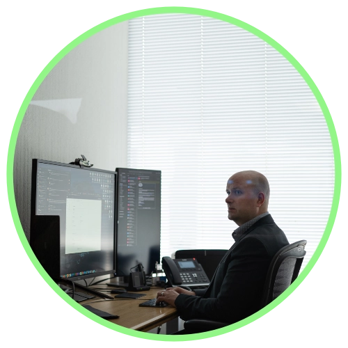 Manawa Networks team member working on the computer